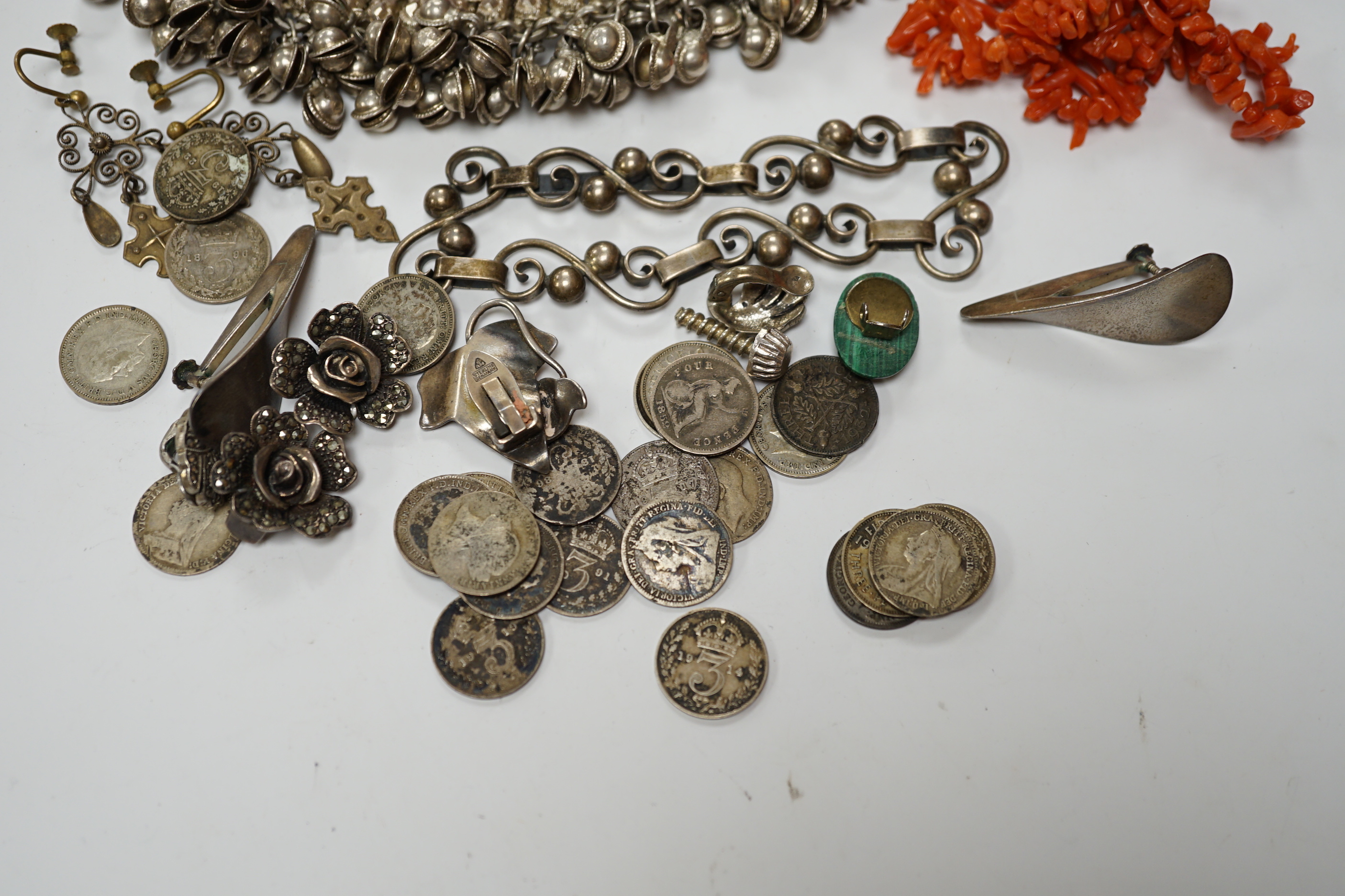 A quantity of assorted jewellery including costume, a pair of Danish sterling ear clips, a 1960's Nanna & Jorgen Ditzel for Georg Jensen sterling silver brooch, no.328, 51mm, a pair of Georg Jensen sterling ear clips, no